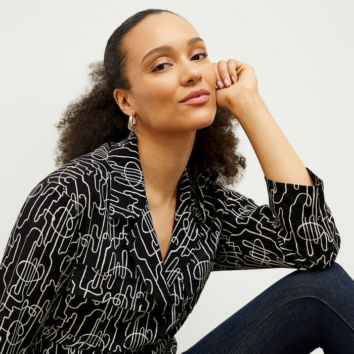 front image of a woman wearing the alyssa jacket in symphony print | Exclude