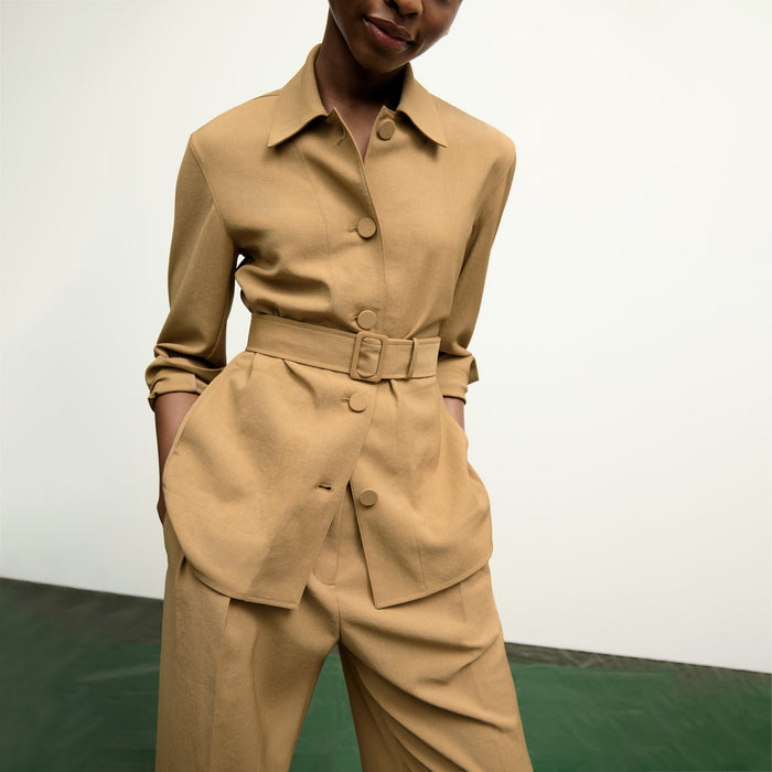 image of a woman wearing the avelyn jacket in macaroon