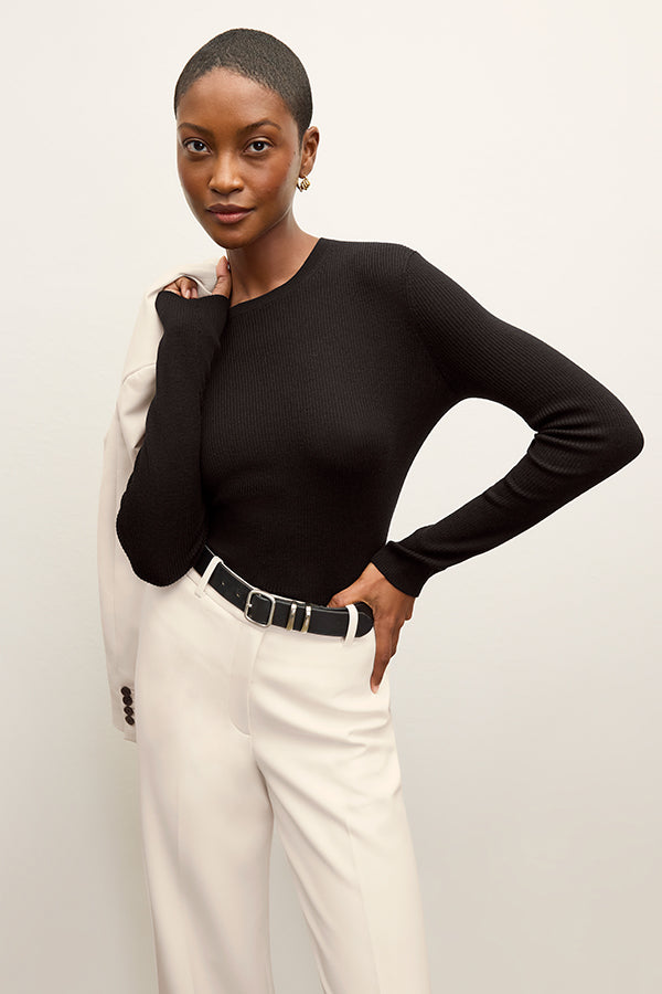 front image of a woman wearing the beck sweater in black | Exclude | Grid