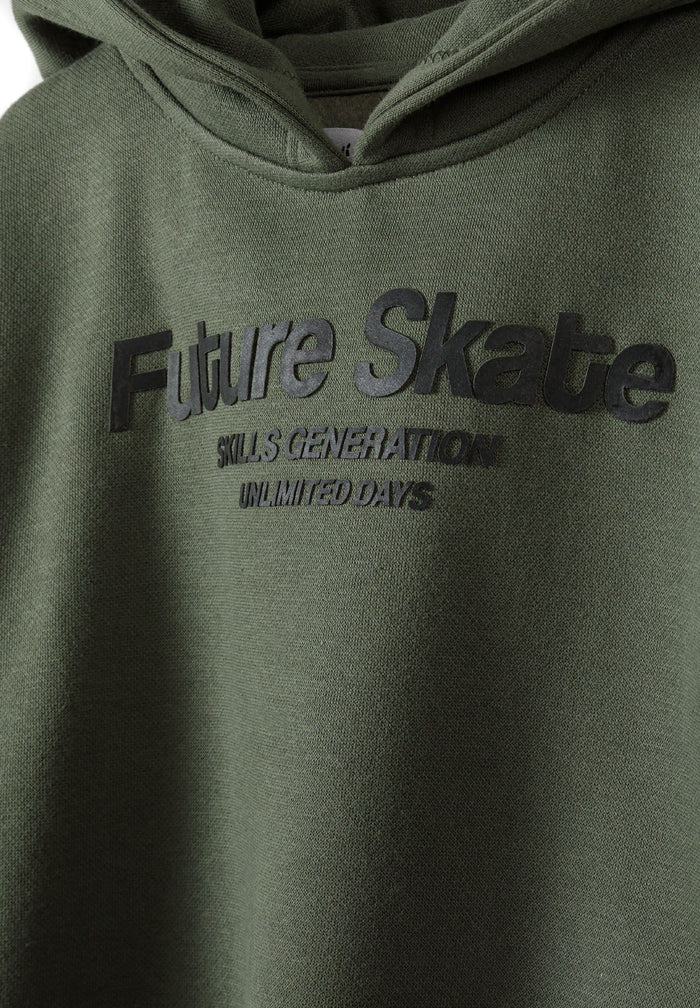 Close-up of khaki hoodie featuring 'Future Skate' rubber print on the chest.