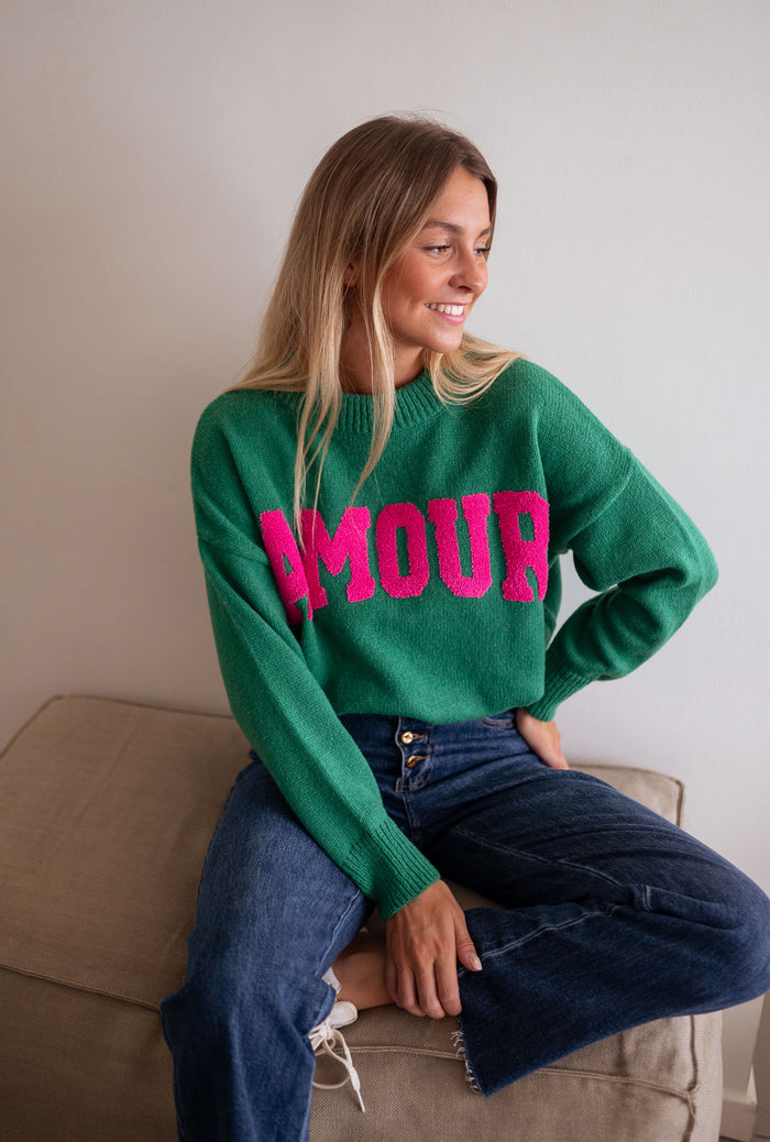 Green sweater knit detail