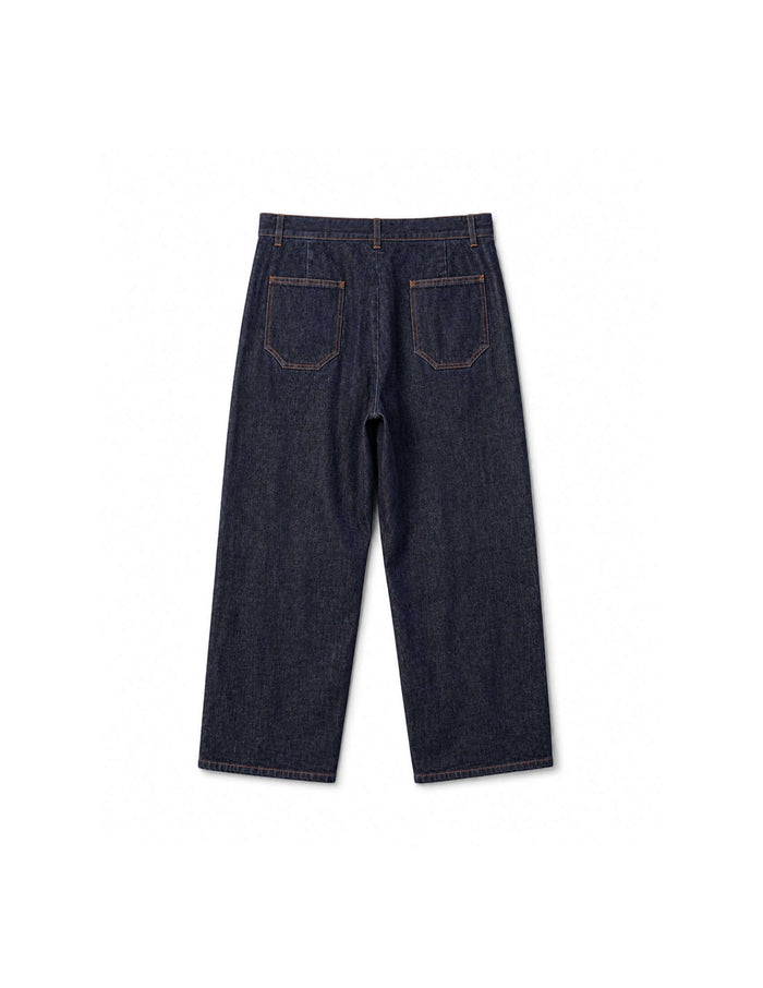Back view of Kura Indigo Jeans featuring wide-leg cut, angled pockets, and contrast stitching.