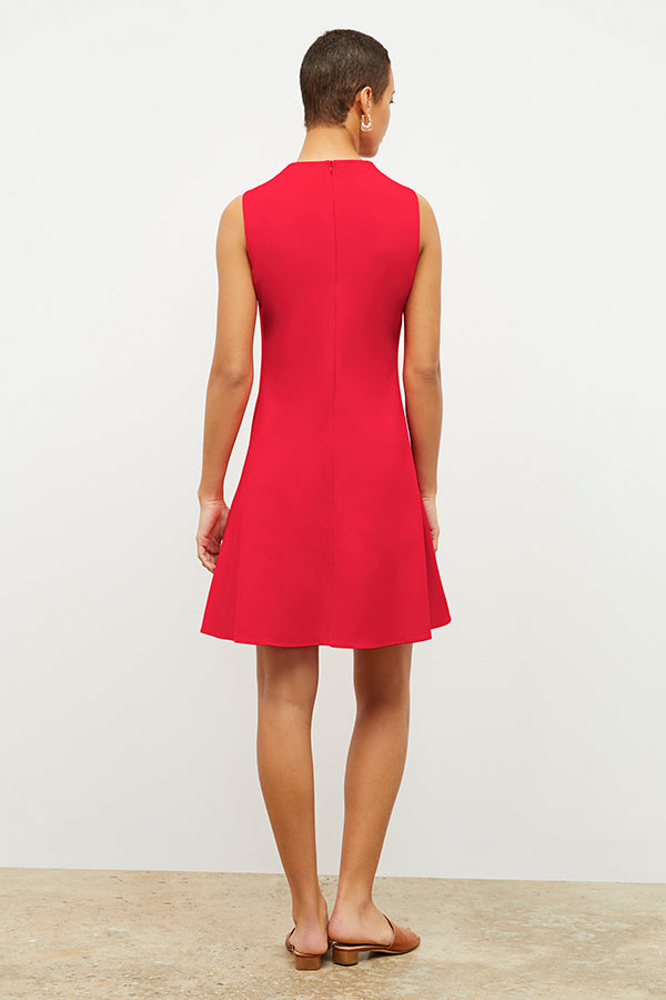 Back image of a woman wearing the malala dress in flame | Exclude