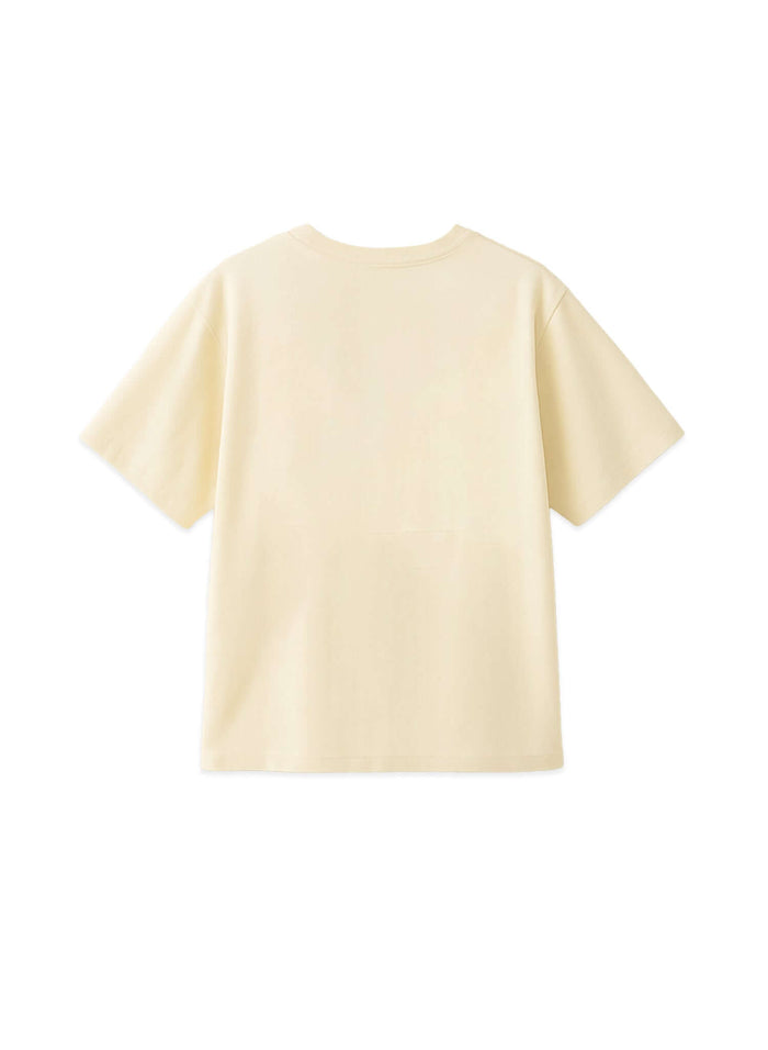 Back view of a monogram embroidered cotton t-shirt in French vanilla color showcasing a clean, comfortable design.