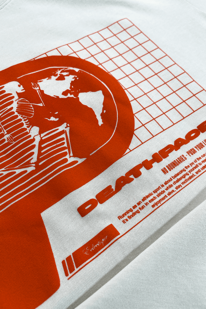 Running graphic t-shirt featuring bold printed artwork centered on a white cotton tee, showcasing an eclectic design.