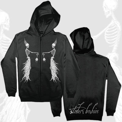 Stolen Babies black hoodie with a white skeletal figure holding objects on the front and Stolen Babies text on the lower back. Monochrome, gothic style.