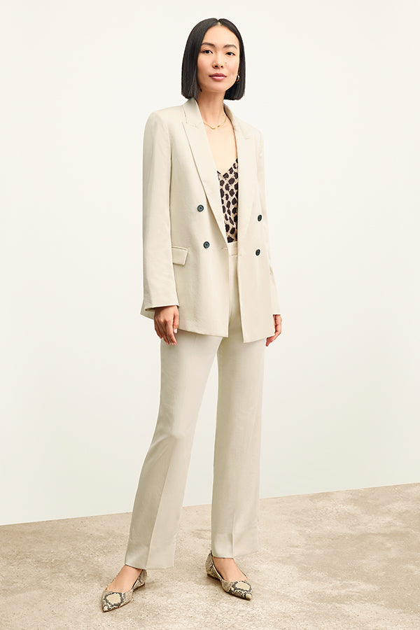 front image of a woman wearing the smith pant in champagne | Exclude | Grid Hover