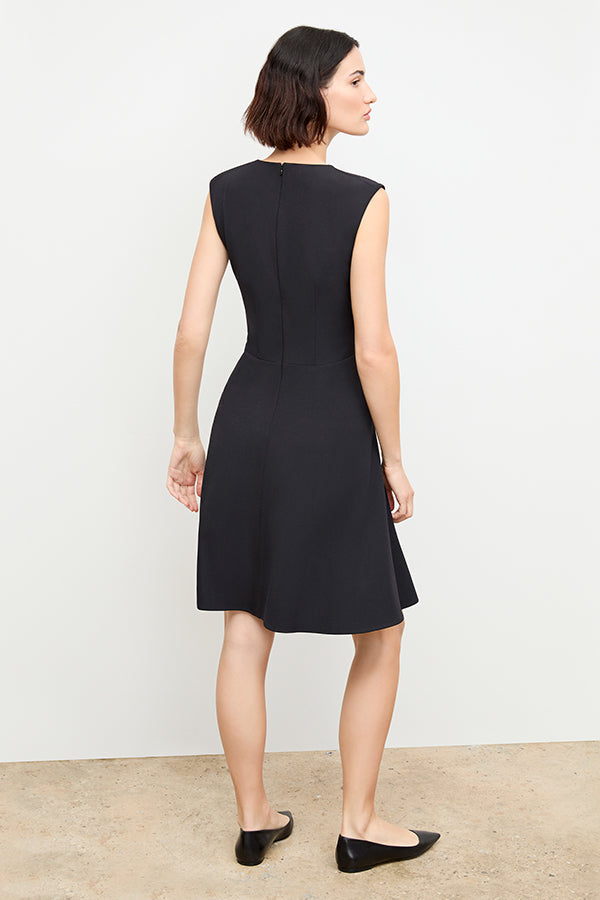 back image of a woman wearing the toi dress in black | Exclude