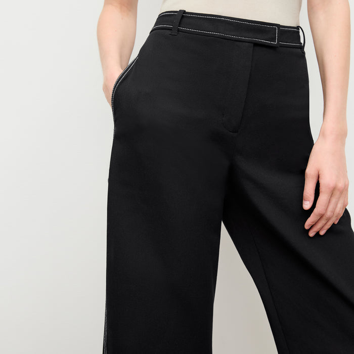 detail image of a woman wearing the abby pant in black