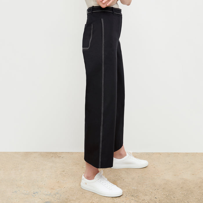 side image of a woman wearing the abby pant in black