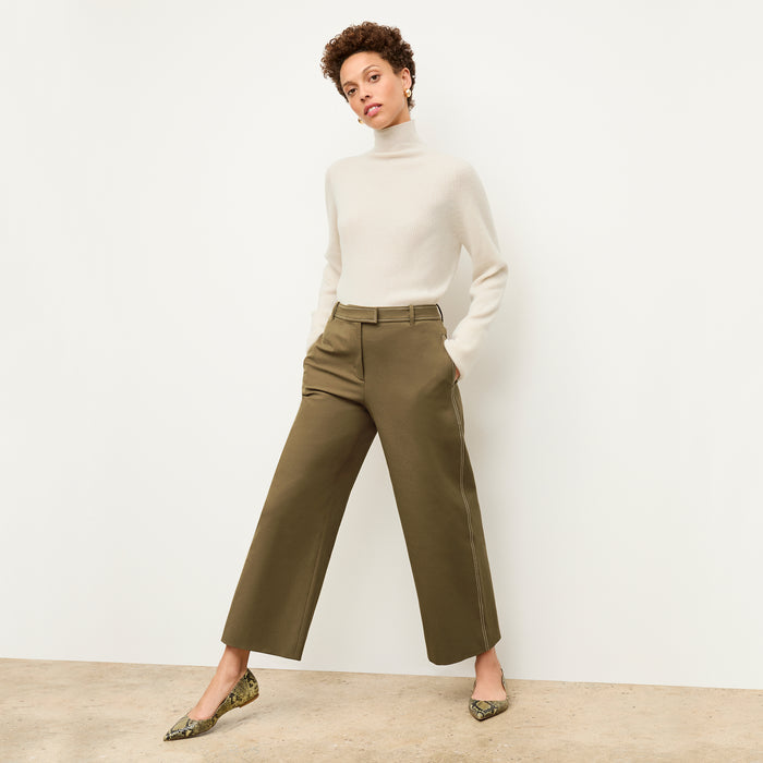 front image of a woman wearing the abby pant in oregano | Lead