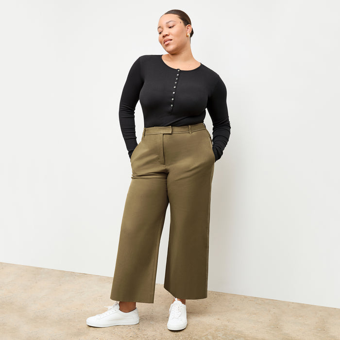 front image of a woman wearing the abby pant in oregano