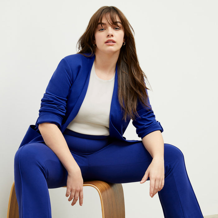 front image of a woman wearing the allyn pants in electric blue | Exclude