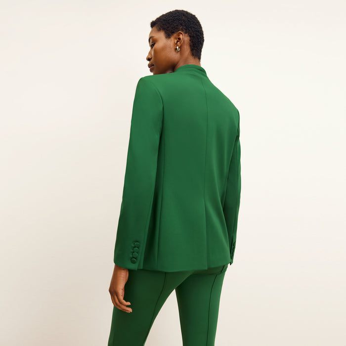 back image of a woman wearing the allyn pants in shamrock