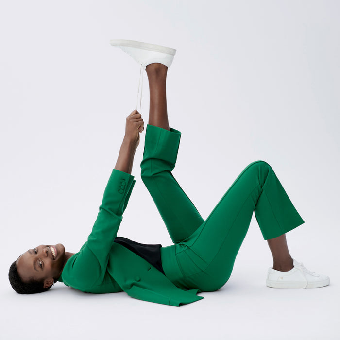 side image of a woman wearing the allyn pants in shamrock
