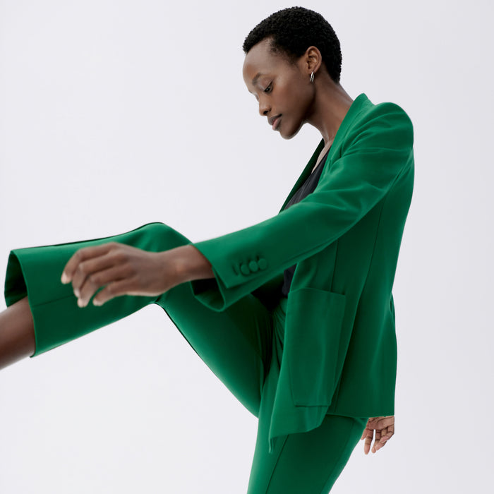 side image of a woman wearing the allyn pants in shamrock