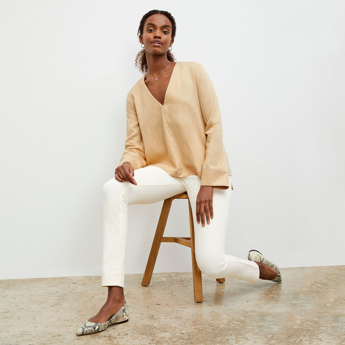 Front image of a woman wearing the Annette Top - Everyday Twill in Butter | Lead