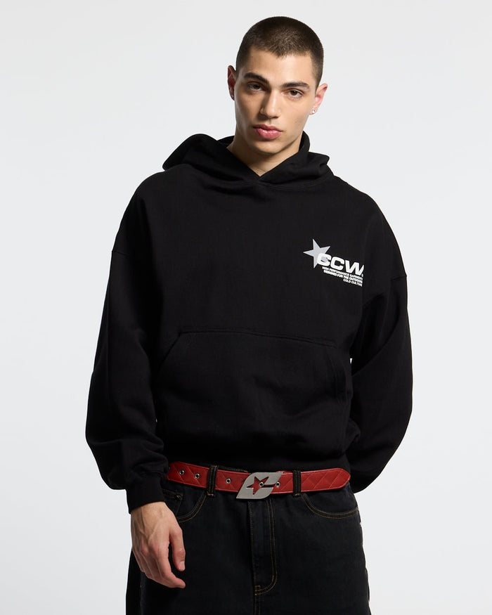 ASTRO HOODIE BLACK - black star print hoodie, front view on male model - Cold Culture #man