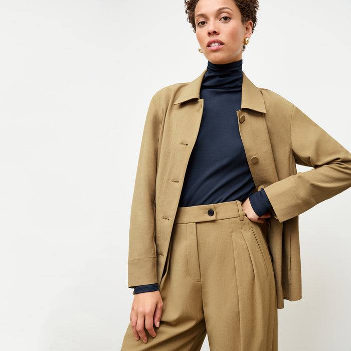 front image of a woman wearing the avelyn jacket in macaroon | Lead
