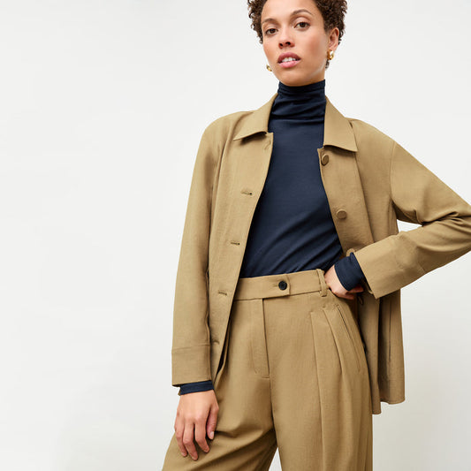 front image of a woman wearing the avelyn jacket in macaroon | Lead