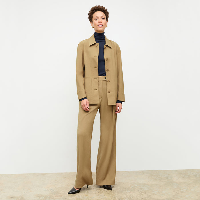 front image of a woman wearing the avelyn jacket in macaroon