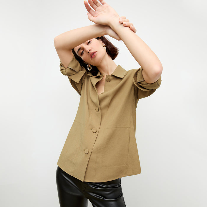 front image of a woman wearing the avelyn jacket in macaroon