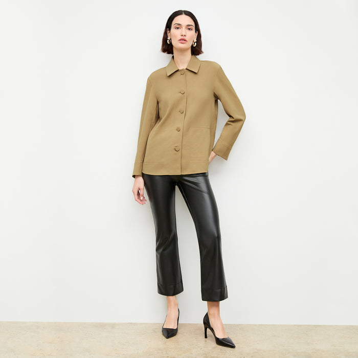 front image of a woman wearing the avelyn jacket in macaroon