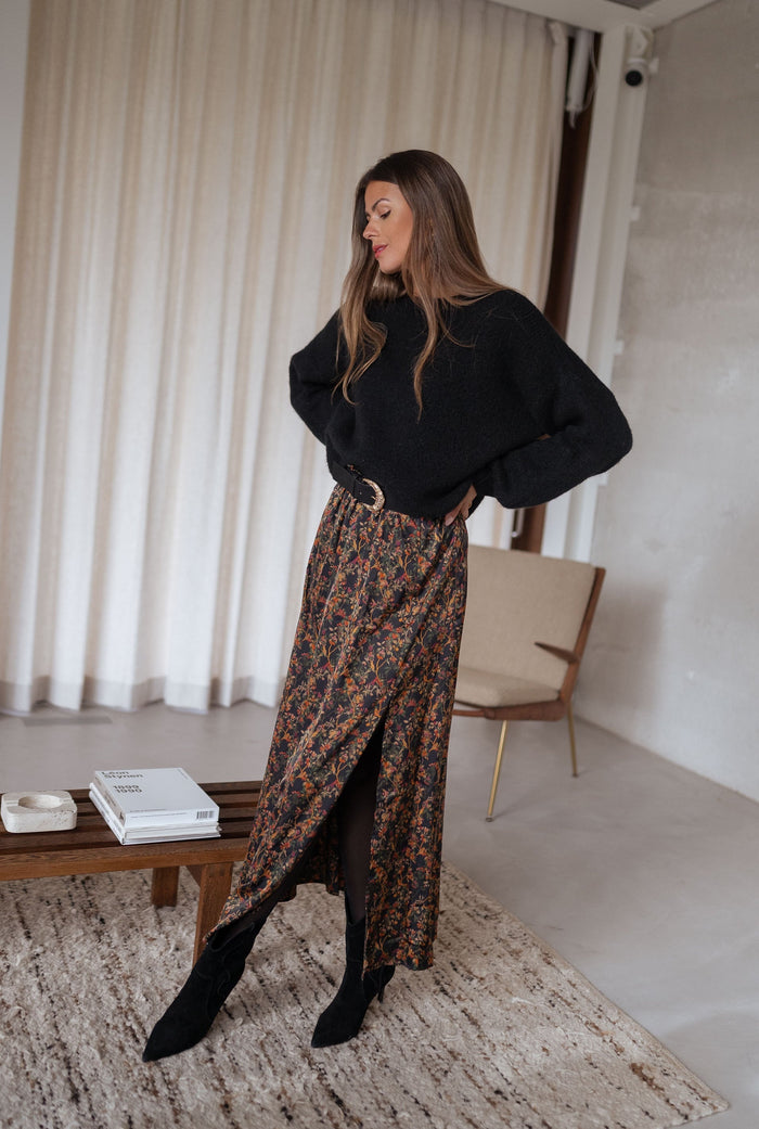 Front view of dark floral print skirt