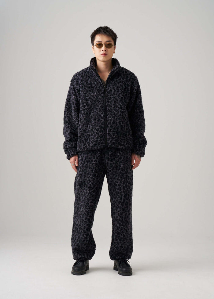 Black leopard fleece jacket styled on model by Éclectique