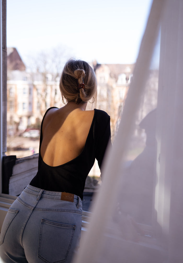 Black Yael crewneck bodysuit front detail