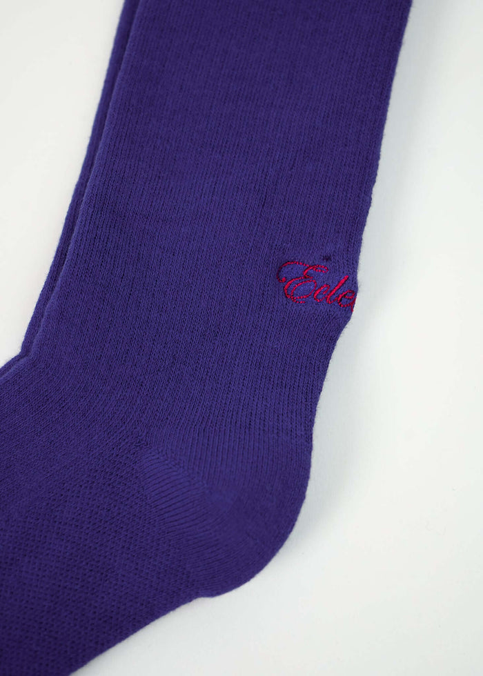 Blue crew socks from Éclectique in a vibrant shade of purple with smooth knit construction.