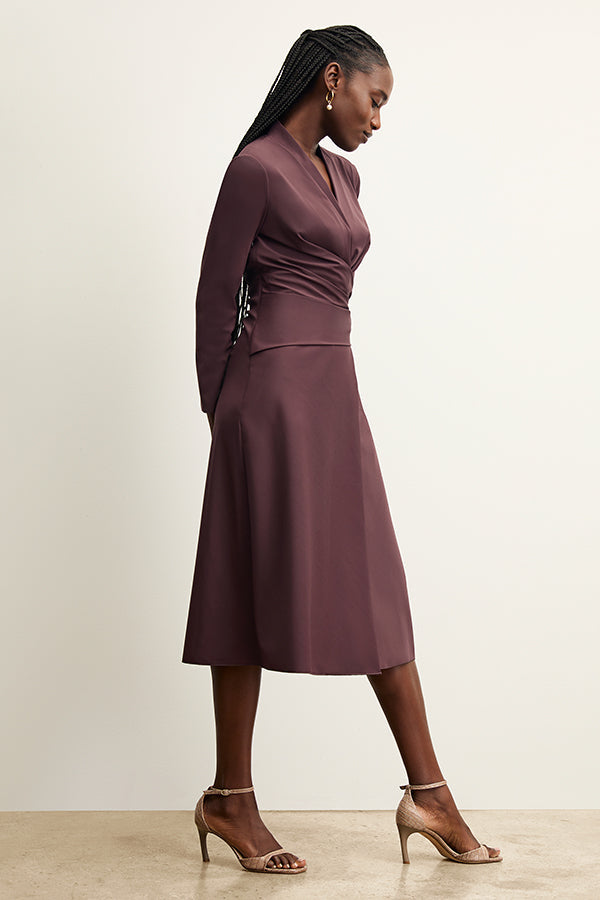 side image of a woman wearing the carly dress in grape | Exclude | Grid Hover