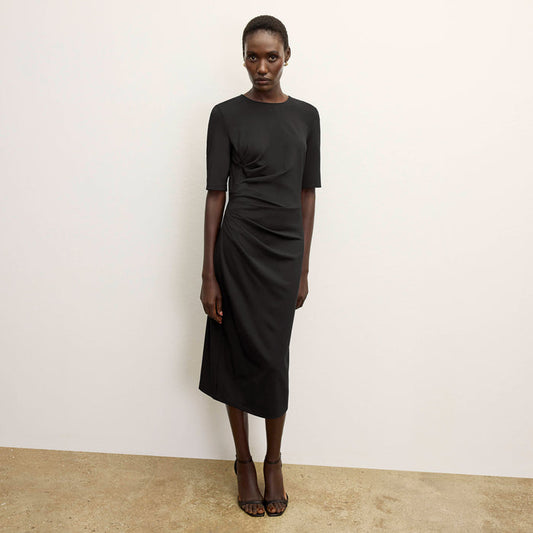 front image of a woman wearing the ciela dress in black  | Lead
