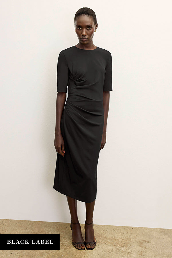 front image of a woman wearing the ciela dress in black | Exclude | Grid