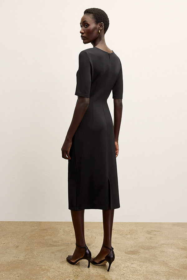 front image of a woman wearing the ciela dress in black | Exclude | Grid Hover