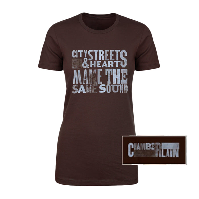 A Chamberlain brown t-shirt features CITY STREETS & HEARTS MAKE THE SAME SOUND in distressed white letters, plus a small inset with CHAMBERLAIN printed in white.