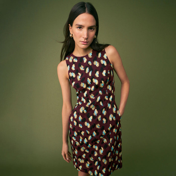 mood image of a woman wearing the constance dress in bengal jacquard