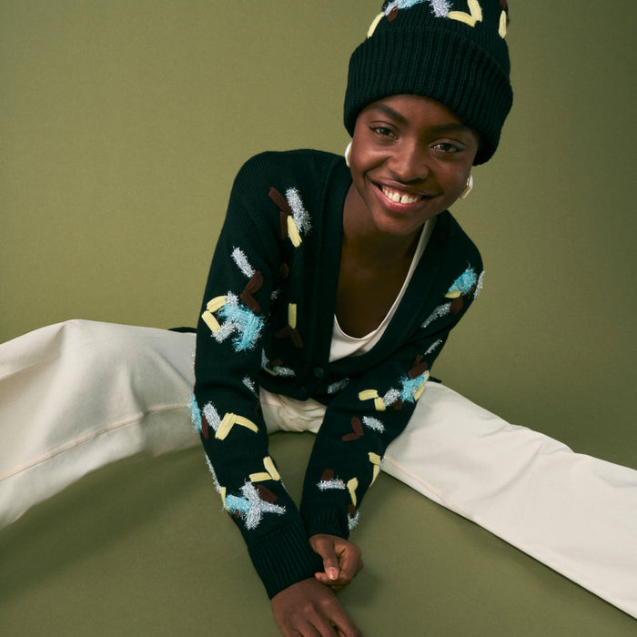 mood image of a woman wearing the cookie cardigan in confetti