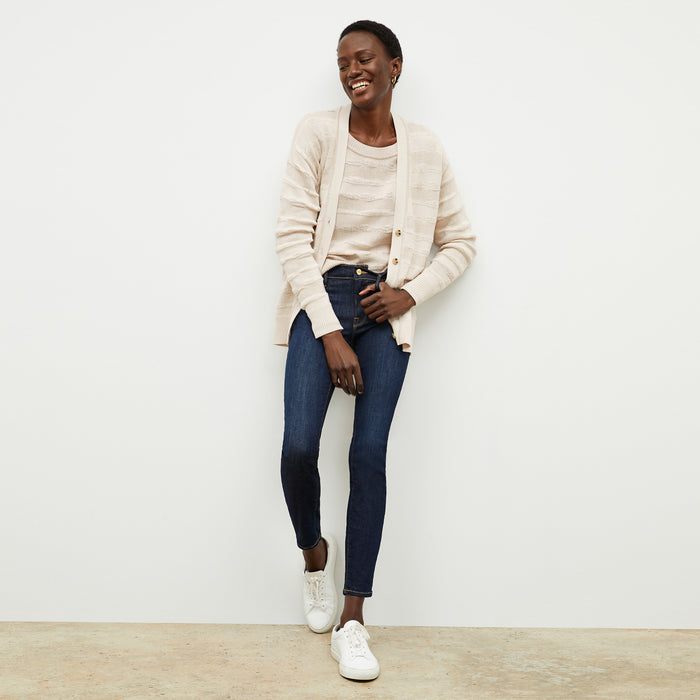 front image of a woman wearing the cookie cardigan in moonbeam | Lead