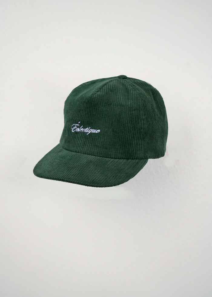 Corduroy script logo snapback hat in June Bug Green, featuring script logo embroidery and adjustable snapback.