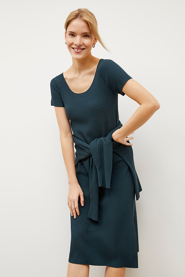Front image of a woman wearing the Danica Dress - Geo Micro Knit in Deep Sea | Grid Hover | Exclude