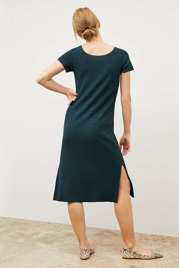 Back image of a woman wearing the Danica Dress - Geo Micro Knit in Deep Sea | Exclude