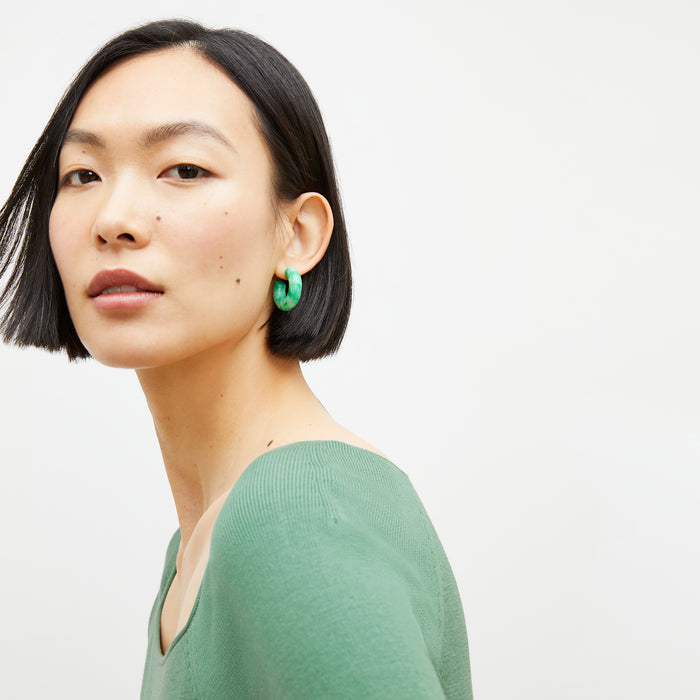 image of a woman wearing the daniela earrings