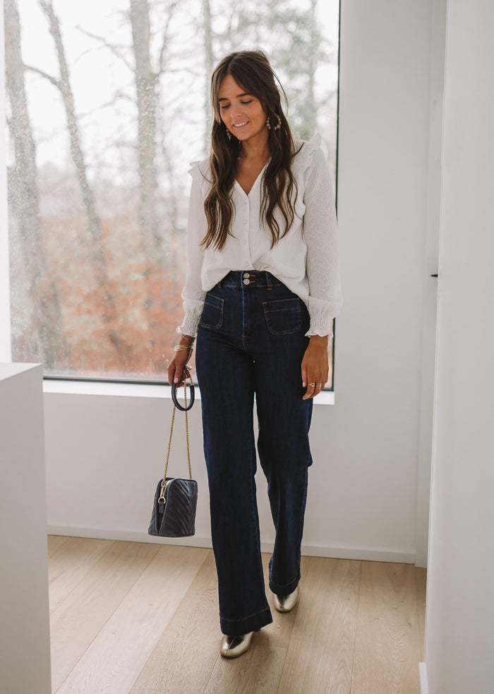 Dark blue Hugues jeans waist and belt loop detail