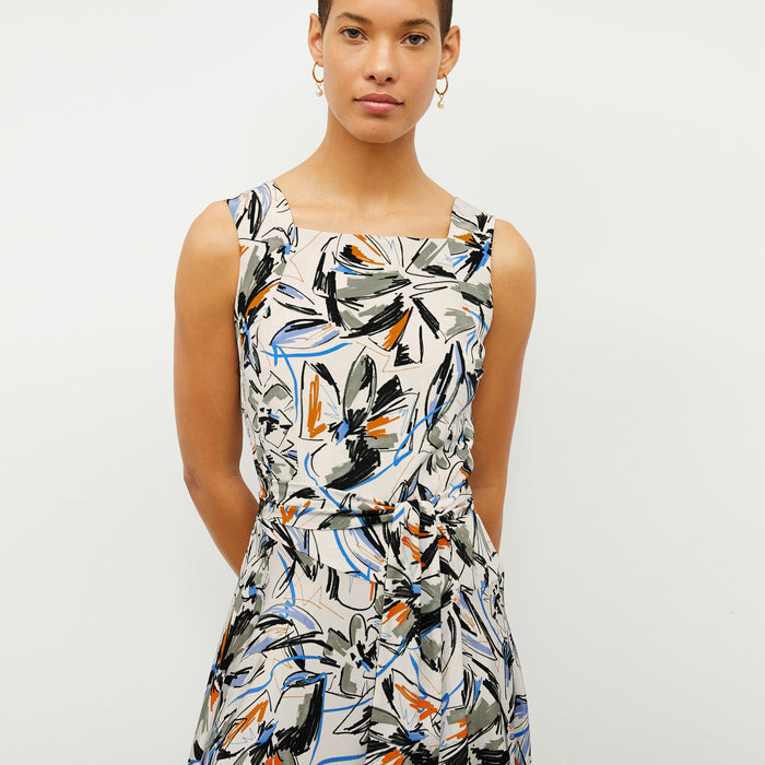 front image of a woman wearing the diemmy dress in sketchbook floral