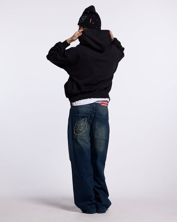 DRIVEN ZIP HOODIE BLACK - black oversized zip-up hoodie, back view on female model - Cold Culture #woman