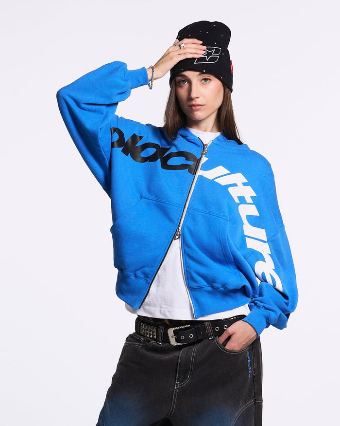 DRIVEN ZIP HOODIE BLUE - blue oversized zip-up hoodie, front view on female model - Cold Culture #woman