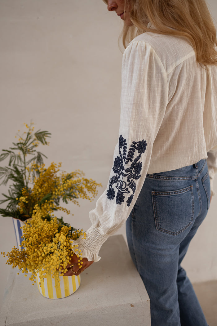 Ecru and Blue Embroidered Salome Blouse styled with Blue Maddie Jeans