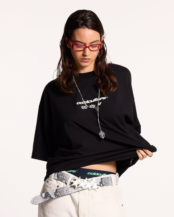 ELECTRIC SHINE TEE BLACK - black graphic print tee, front view on female model - Cold Culture #woman