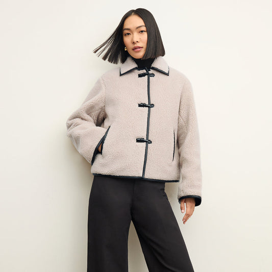 Front image of a woman wearing the eli jacket in travertine | Lead